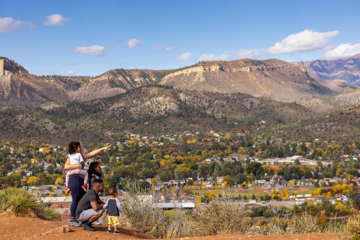 Family hiking the Rim Trail