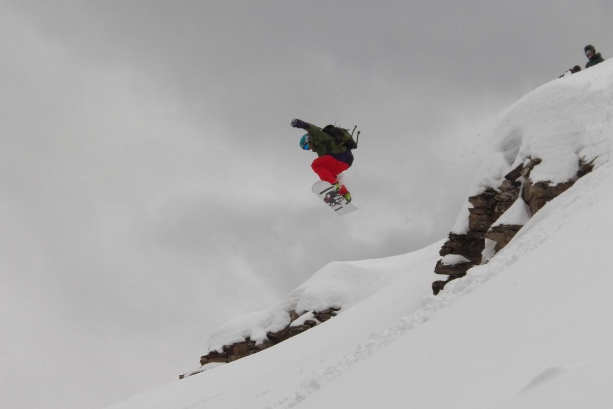 Snowboarder Jumping at Purgatory Resort